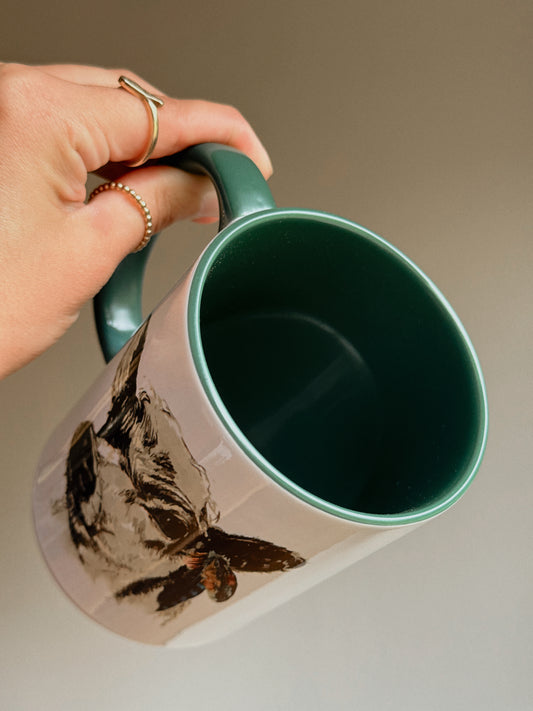 FEATHERED COW MUG