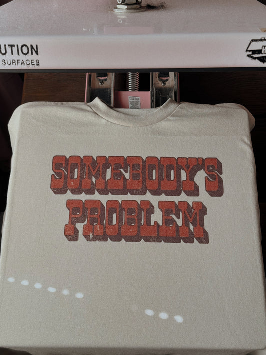 SOMEBODY’S PROBLEM