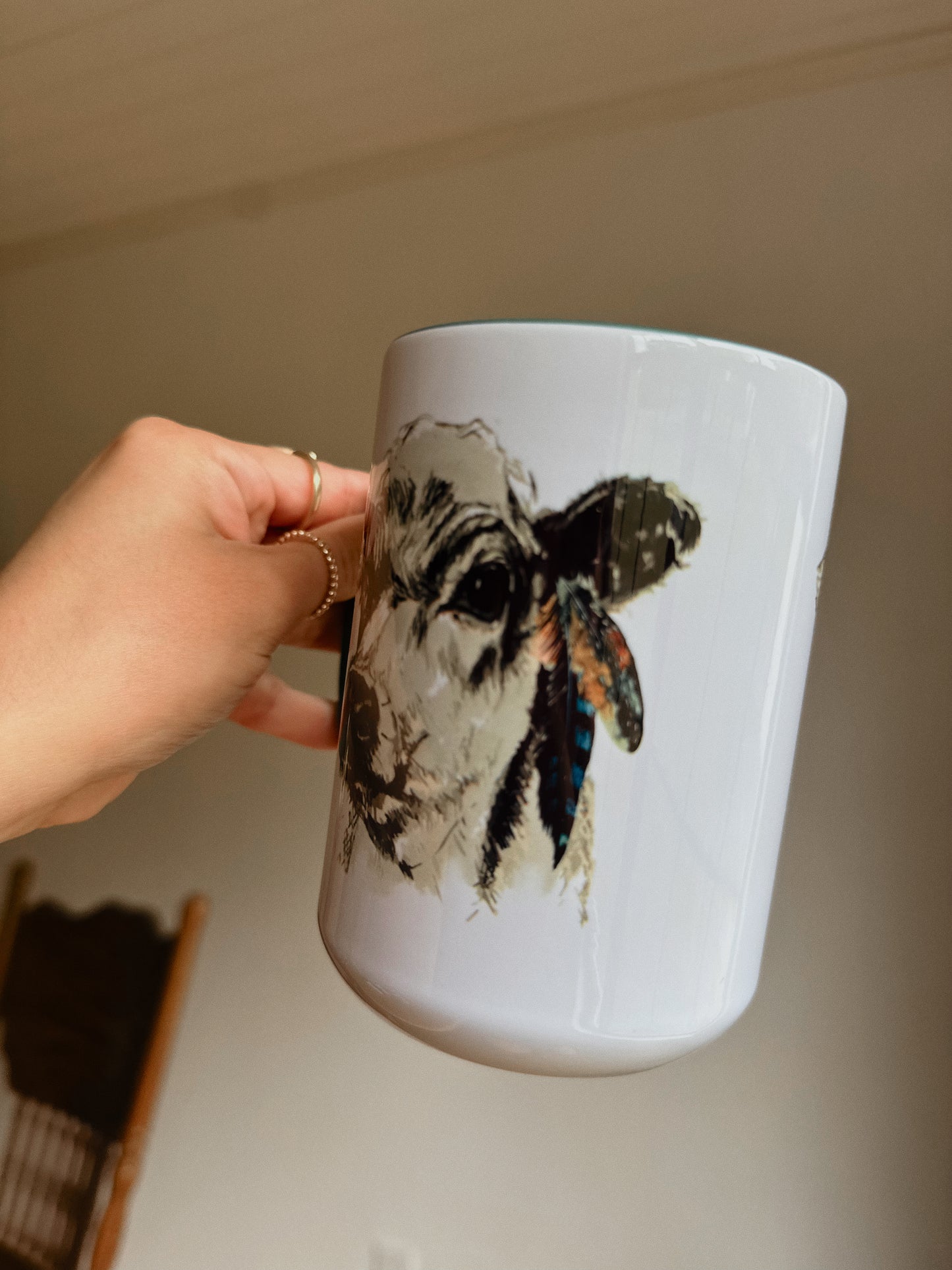 FEATHERED COW MUG